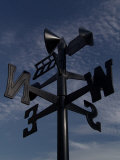 A Weathervane on the Top of the House Roof in Southern France