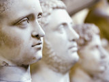 Close-Up of Statue Faces on a Shelf in the Vatican  Rome  Italy