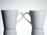 Two Cups with Handles Touching