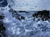Waves Crash on the Shore in a Close-up View of the Ocean
