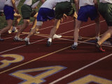 Runners Lined Up on a Track Ready for the Starting Gun