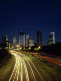 Headlights and Taillights on a Highway and Houston at Night