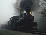 Steam Locomotive Belching Smoke on a Foggy Morning
