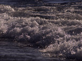 Frothy Wave Spills onto the Shore of Lake Superior