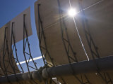 Parobolic Mirrors at a Solar Thermal Plant are Used to Heat Oil