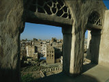 Ancient Buildings of Sanaa are Framed Through a Window