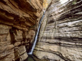 Stream Runs Down a Cliff Face