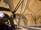 Parobolic Mirrors at a Solar Thermal Plant are Used to Heat Oil