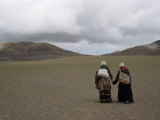 Best Friends Hold Hands as They Walk on the Tibetan Plateau