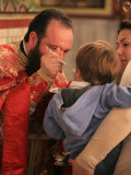 Greek Orthodox Boy Receiving the Eucharist  Thessaloniki  Macedonia  Greece  Europe