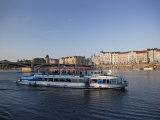 Sightseeing Boat on Vltava River with East Bank and Jiraskuv Bridge  Prague  Czech Republic  Europe