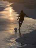 Young Man Playing Football at Sandbeach in Twilight  Santa Maria  Sal  Cape Verde  Africa