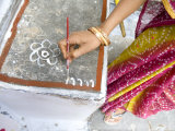 Woman Painting Doorstep with Rice Flour Paste  Making Rangoli Diwali Festival Decorations  India