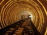 Empty Tourist Subway Car Runs Through Illuminated Tunnel in Shanghai  China