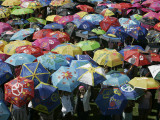 School Children Hold Up their Umbrellas after Taking Part in Umbrellas for Peace March  St Helena