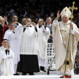 Pope Benedict XVI Acknowledges the Crowd as He Arrives for a Mass