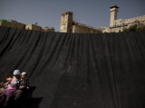 Jewish Woman with Her Children Outside the Tomb of the Patriarchs During Passover Celebrations