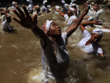 Voodoo Believers Perform a Ceremony at a Sacred Pool in Souvenance  Haiti
