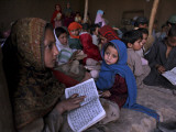 Afghan Refugee Children Holding Copies of the Quran  Repeat after their Teacher