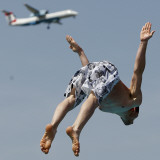 Man Jumps Close to a Landing Airplane in a Public Bath in Duesseldorf  Western Germany