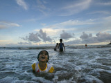 Child as She Plays in the Waves at a Beach in Port Blair  India