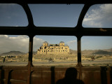 Afghan Drives Past the Darul Aman's Palace in the City of Kabul  Afghanistan