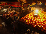 Afghan Fruit Vendor Waits for Customer at a Local Market in Kabul  Afghanistan