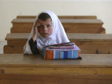 Girl Sits Alone in Her Class Room During a Break in Aftabachi School in Eastern Afghanistan