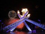 Fireworks Explode Behind the Olympic Flame at Opening Ceremony of Vancouver 2010 Winter Games