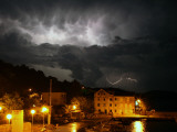 Lightning Illuminates the Sky over Prvic Luka During a Summer Storm on the Island of Prvic  Croatia