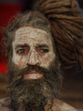 Hindu Holy Man Looks on from the Banks of River Ganges During the Kumbh Mela Festival in Haridwar
