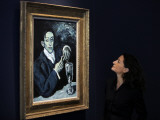 Giovanna Bertazzoni Poses for Photographers in Front of 1903 Pablo Picasso's "The Absinthe Drinker"