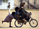 Girls Play on a Bike in Jammu  India