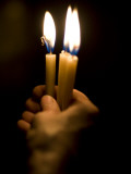 Christian Pilgrim Holds Candles  Participating in Easter Mass at the Church of the Holy Sepulcher