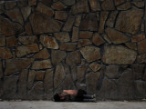 Afghan Boy Sleeps on Ground as He Begs for Alms in Kabul  Afghanistan