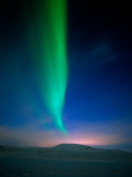 Aurora Borealis over a Snowy Landscape  Iceland