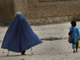 Afghan Girl Carries the Ration of Her Mother  a Victim of Land Mines  in Kabul  Afghanistan
