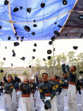 Some of 149 Graduating Cadets of Philippine Military Academy Throw their Pershing Caps in Air