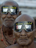 Sadhus  or Hindu Holy Men  Watch the Solar Eclipse in Allahabad  India