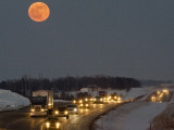 Blue Moon Rises over Interstate 80 West of Omaha  Nebraska