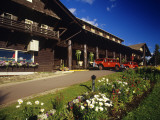 Red Jammer Buses Parked in Front of Glacier Park Lodge in East Glacier  Montana  USA