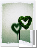 A Green Love Sign with its Shadow