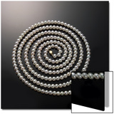 String of Pearls in a Coil