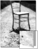 Empty Straight-Backed Chair in Spotlight