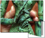 Fingers Holding the Waist of a Bronze Shiva Statue