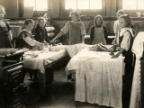 Young Girls Ironing in Laundry Room  Surrey
