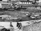 A View of the Inner Harbour at Low Tide  at Polperro  Cornwall  England