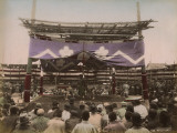 A Sumo Wrestling Contest Taking Place in Japan  Watched by a Large Crowd of Spectators