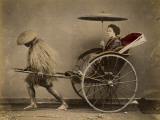 A Japanese Lady with a Parasol Rides in a Rickshaw Pulled by a Coolie