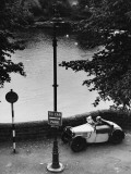 Old Man in a Small Car by the River Dee - Chester